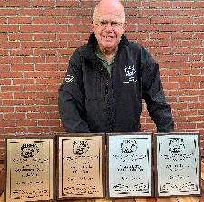 Jim Crook NBHA Overall Amateur Handler of the Year Winner is pictured here wearing his Amateur Handler Jacket and is displaying his Amateur Handler of the Year Plaque. Jim was also the Amateur Derby Handler of the Year Winner. Jim had the top two Amateur Derby's, Amateur Derby Winner Outlaw Masterson, PM and Runner-Up Amateur Derby Winner Outlaw Romano, PM. 
