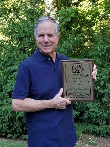 Edward Marron receiving his award for his dog Indian Creek Courageous Cat as the Runner-Up NBHA Open Shooting Dog of the Year award winner. 
