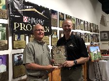 Owner Greg Blair accepting the award of Amateur Derby of the Year for pointer male Blair's Calvary Mountain from President Ken Sauer.  Blair's Calvary Mountain also won RU Open Derby of the Year as well.