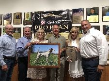 Accepting the honor of 2020-2021 NBHA Open Shooting Dog of the Year along with the commemorative portrait of “Pure Confidence” was the Black Meadows Kennel team with Ed Marron, Patty Hensley, Lori Bleeker, and John Bleeker.