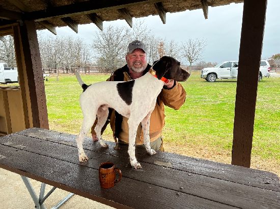 Larry Seybert Sr. with Ace the winner of the NBHA Amateur Shooting Dog (JC@F). 