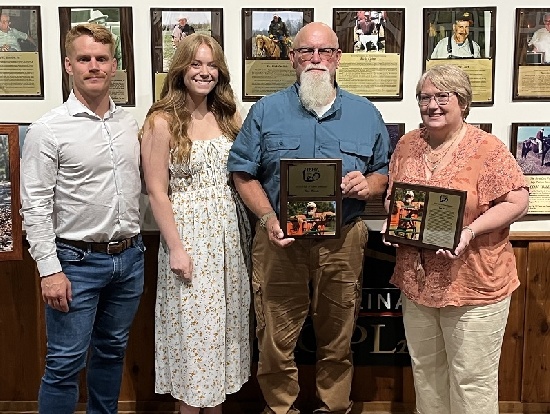 Tom Woods and family accepting commemoration into the NBHA Hall of Fame.